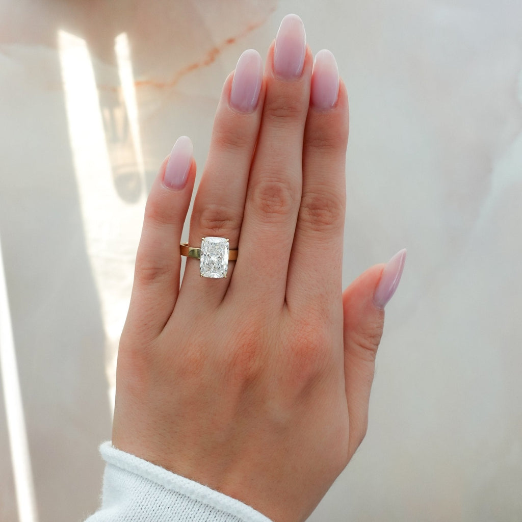 Finest Solitaire Engagement Ring With Elongated Cushion Cut Diamond