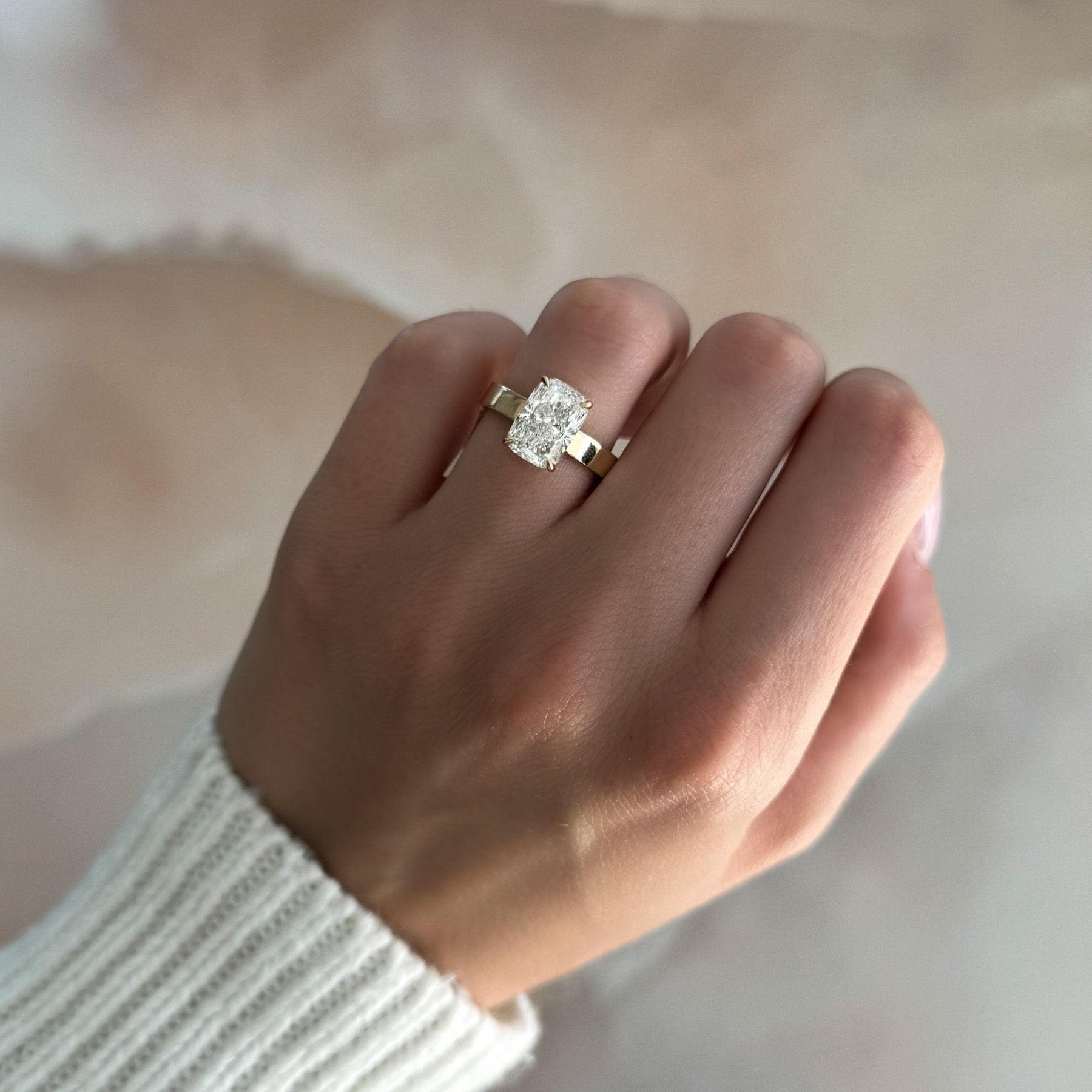 Finest Solitaire Engagement Ring With Elongated Cushion Cut Diamond