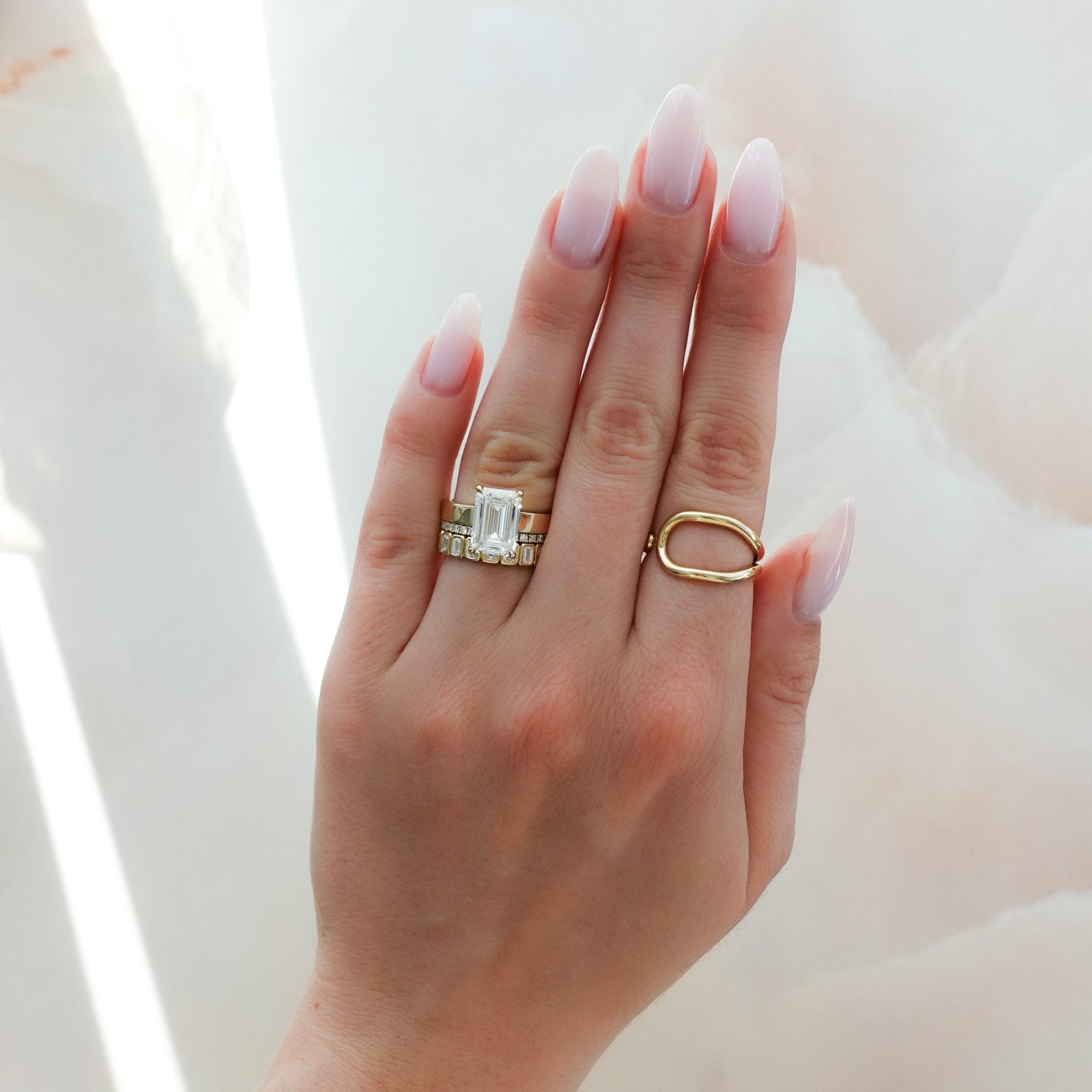 Finest Solitaire Engagement Ring With Emerald Cut Diamond