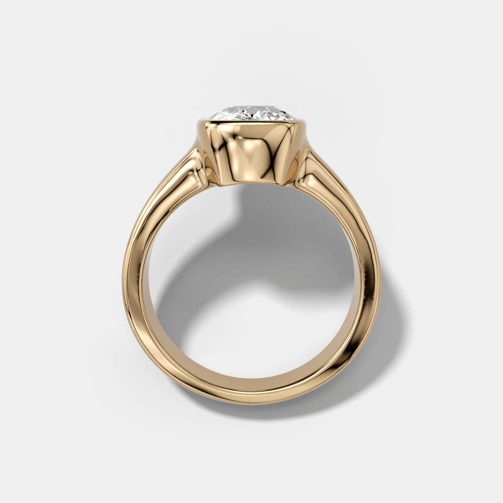 Finest Tapered Bezel Set Engagement Ring With Elongated Cushion Cut Diamond