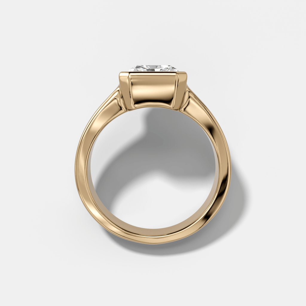 Finest Tapered Bezel Set Engagement Ring With Elongated Radiant Cut Diamond
