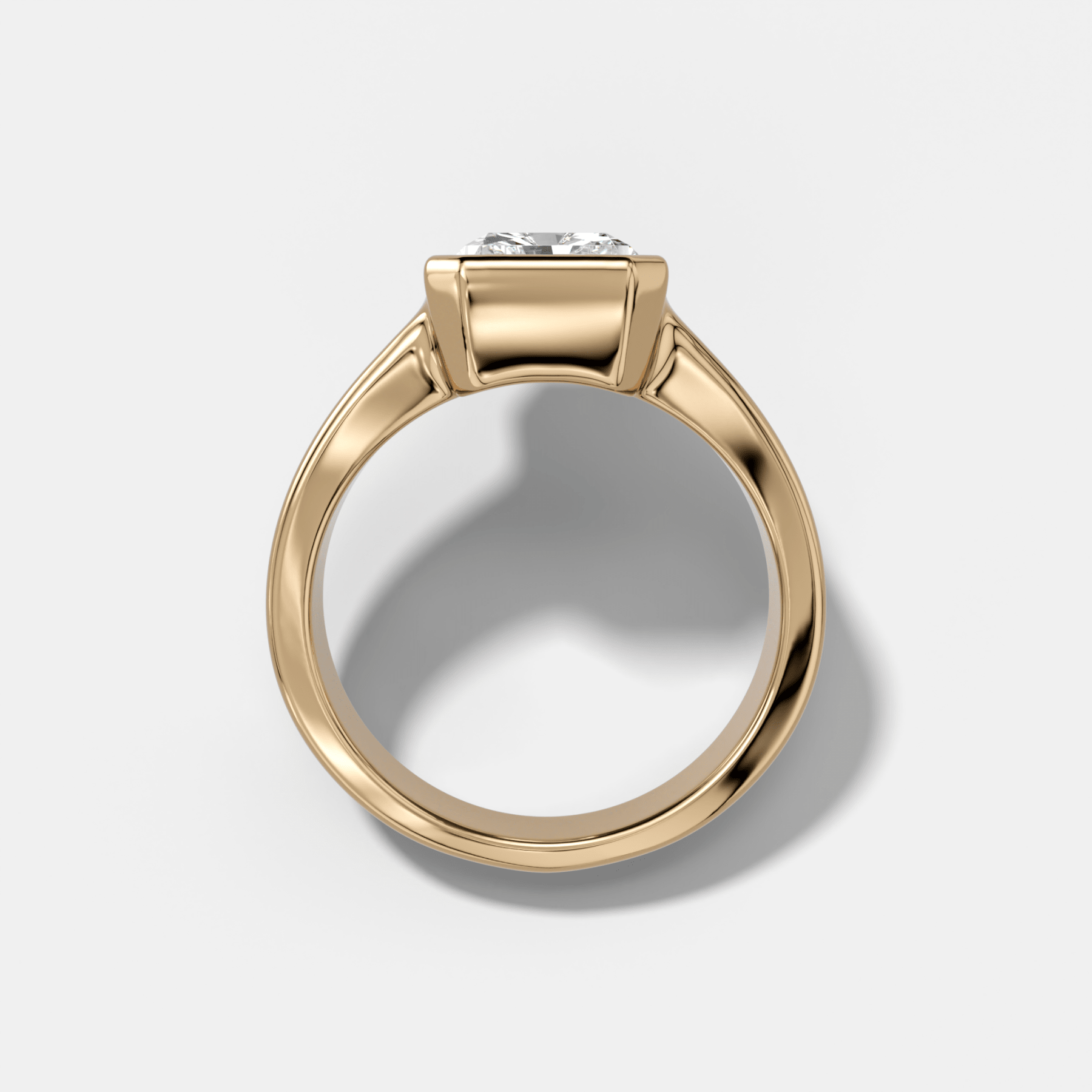 Finest Tapered Bezel Set Engagement Ring With Elongated Radiant Cut Diamond