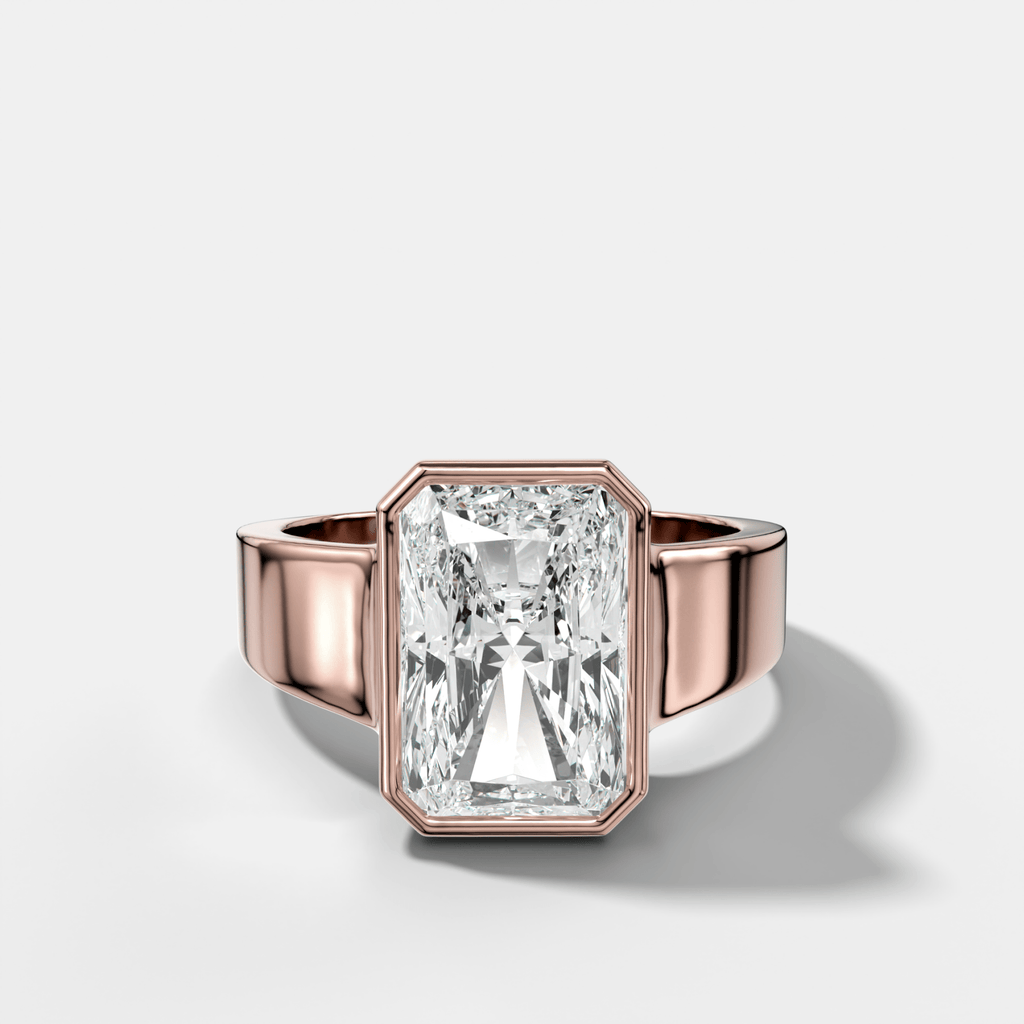 Finest Tapered Bezel Set Engagement Ring With Elongated Radiant Cut Diamond