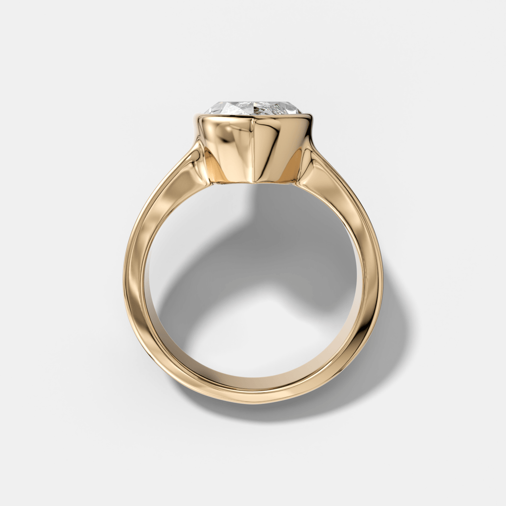 Finest Tapered Bezel Set Engagement Ring With Marquise Cut Diamond