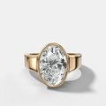 Finest Tapered Bezel Set Engagement Ring With Oval Cut Diamond