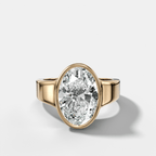Finest Tapered Bezel Set Engagement Ring With Oval Cut Diamond