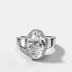Finest Tapered Bezel Set Engagement Ring With Oval Cut Diamond