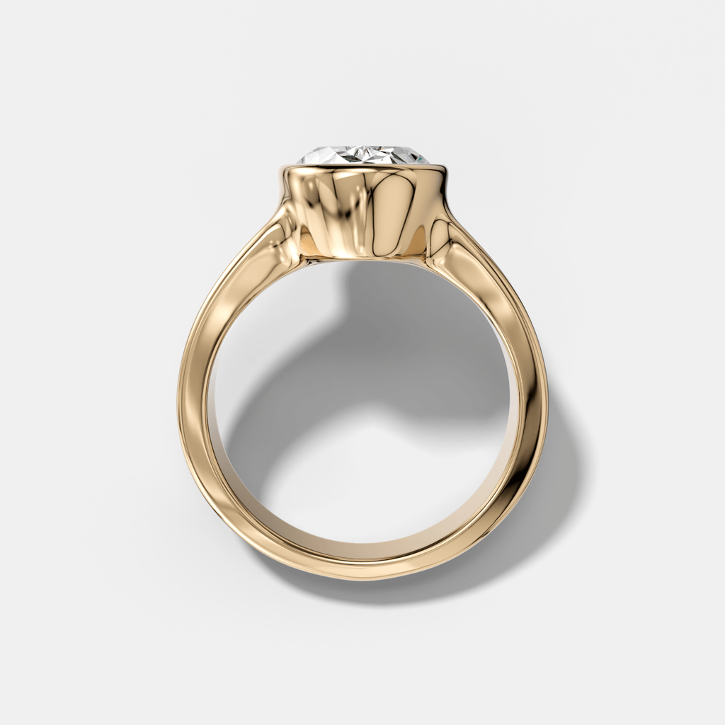 Finest Tapered Bezel Set Engagement Ring With Oval Cut Diamond