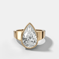 Finest Tapered Bezel Set Engagement Ring With Pear Cut Diamond