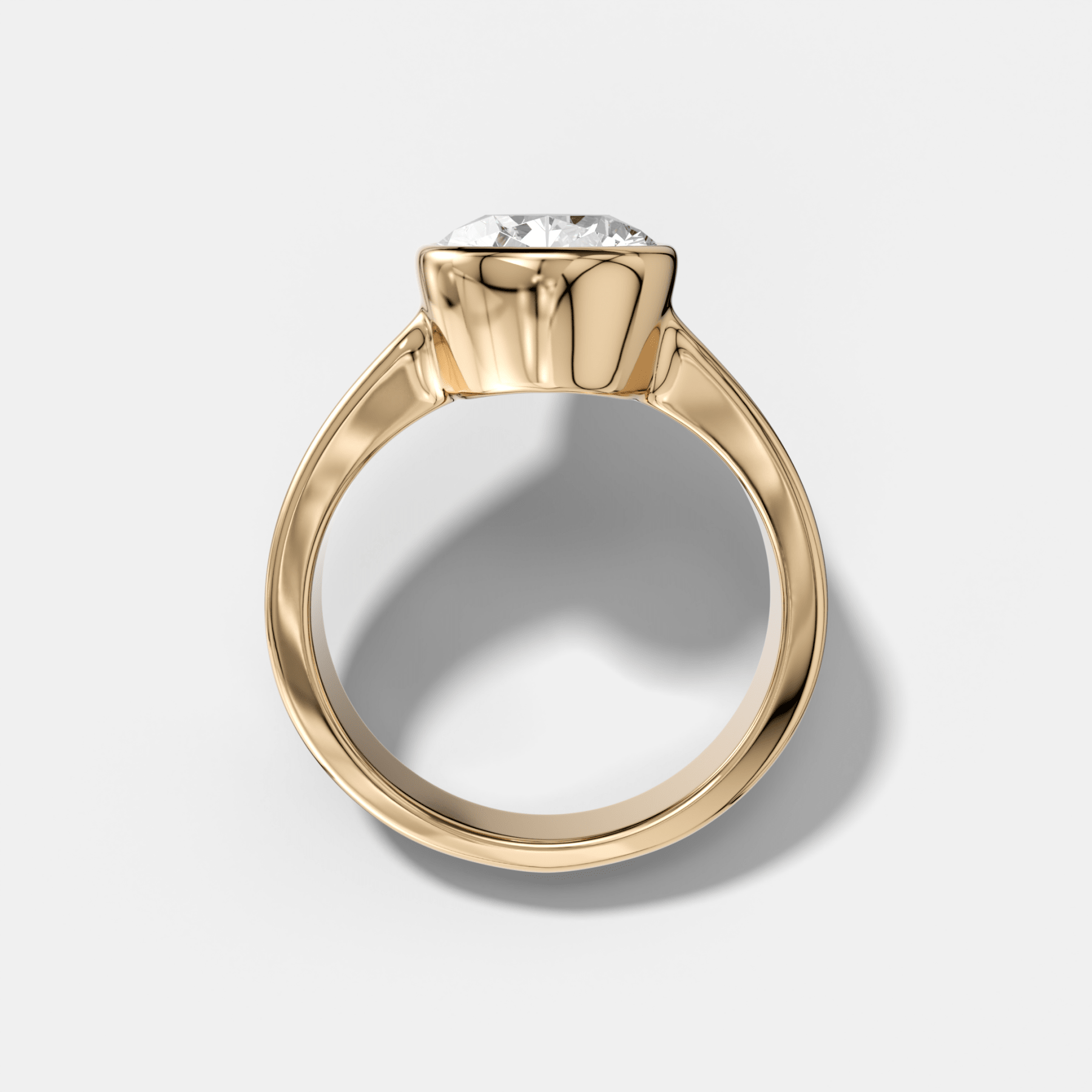 Finest Tapered Bezel Set Engagement Ring With Pear Cut Diamond