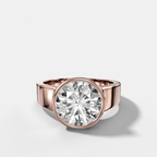 Finest Tapered Bezel Set Engagement Ring With Round Cut Diamond