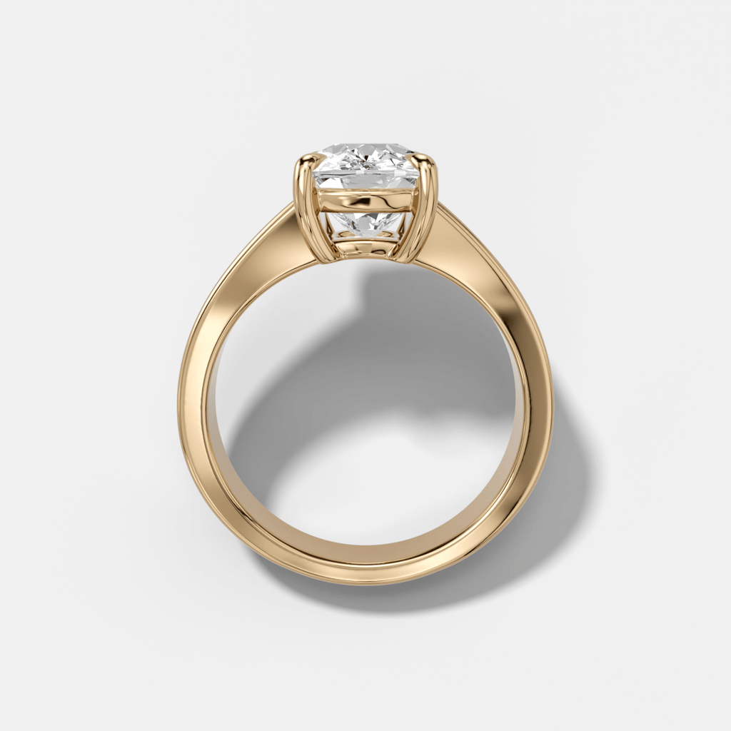 Finest Tapered Engagement Ring With Elongated Cushion Cut Diamond