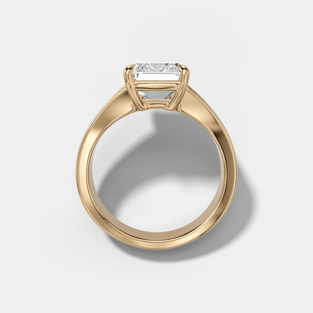 Finest Tapered Engagement Ring With Emerald Cut Diamond