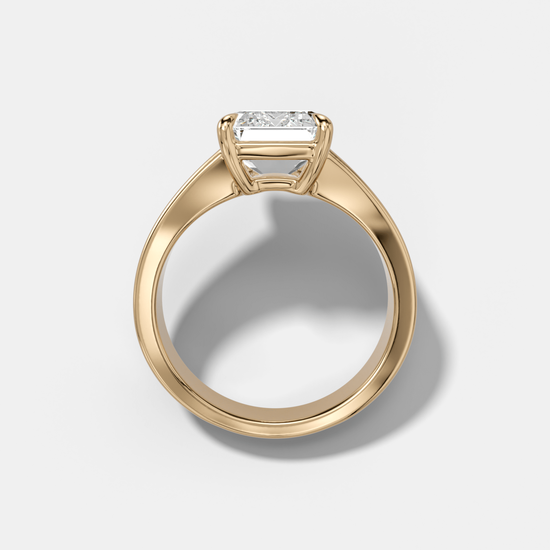 Finest Tapered Engagement Ring With Emerald Cut Diamond