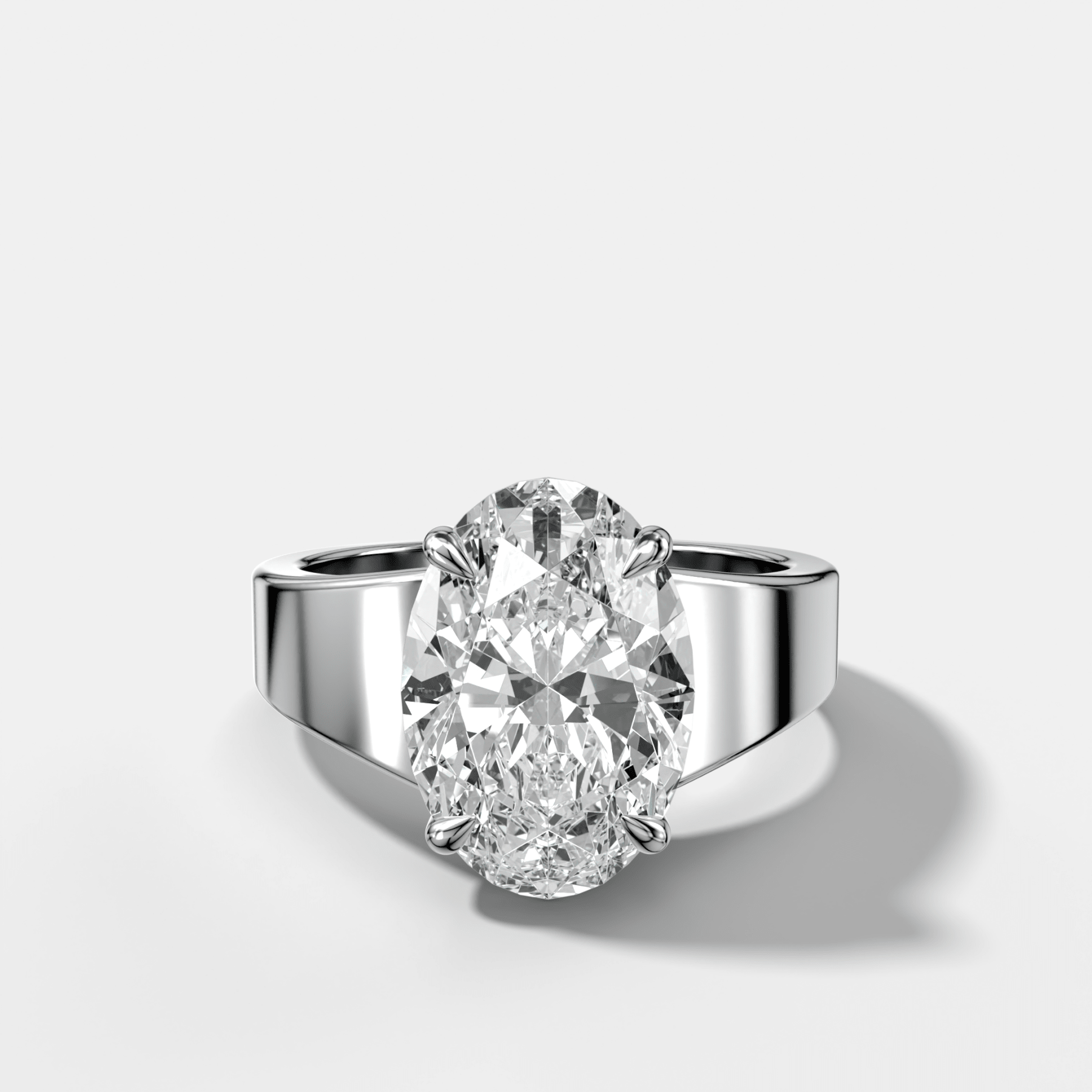 Finest Tapered Engagement Ring With Oval Cut Diamond