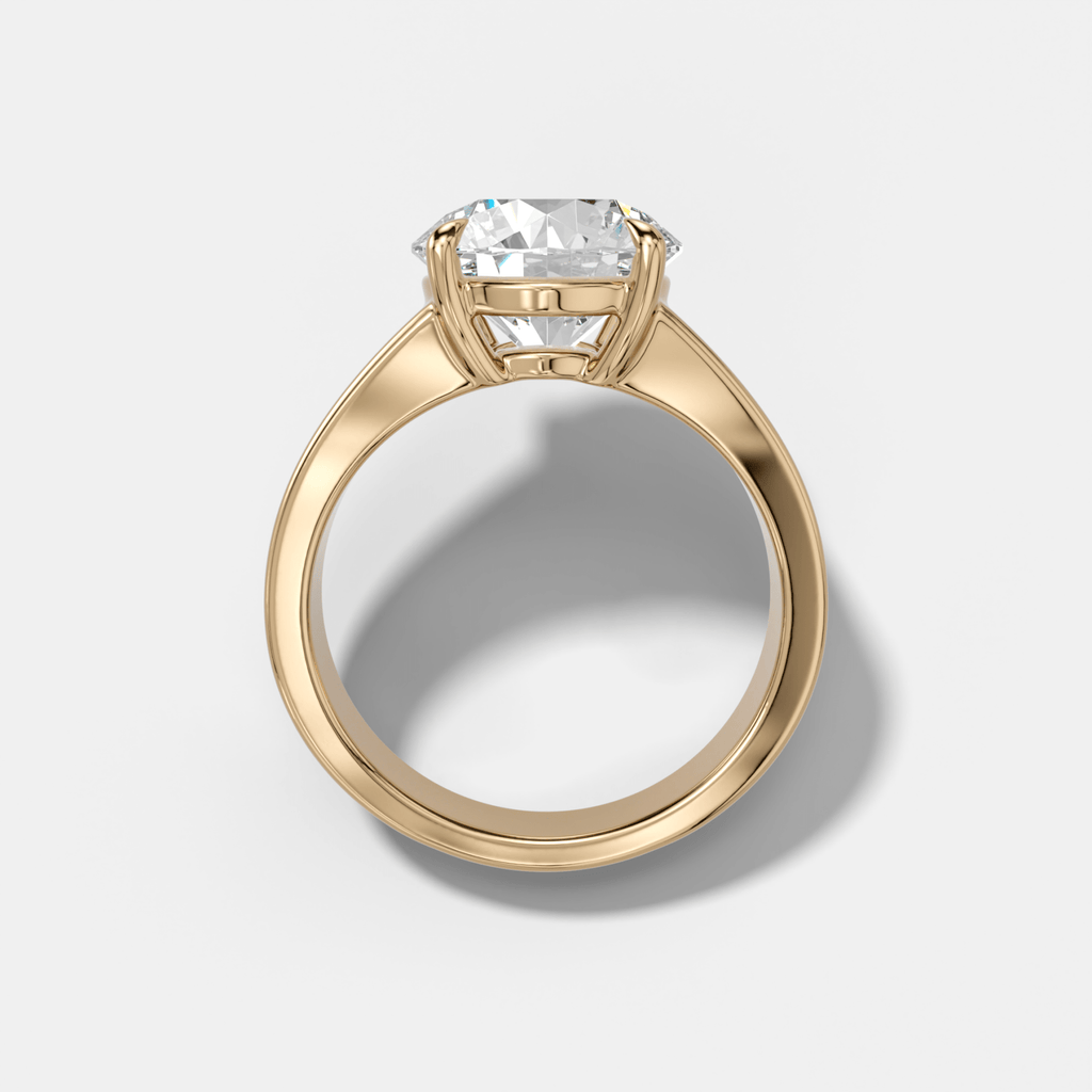 Finest Tapered Engagement Ring With Round Cut Diamond
