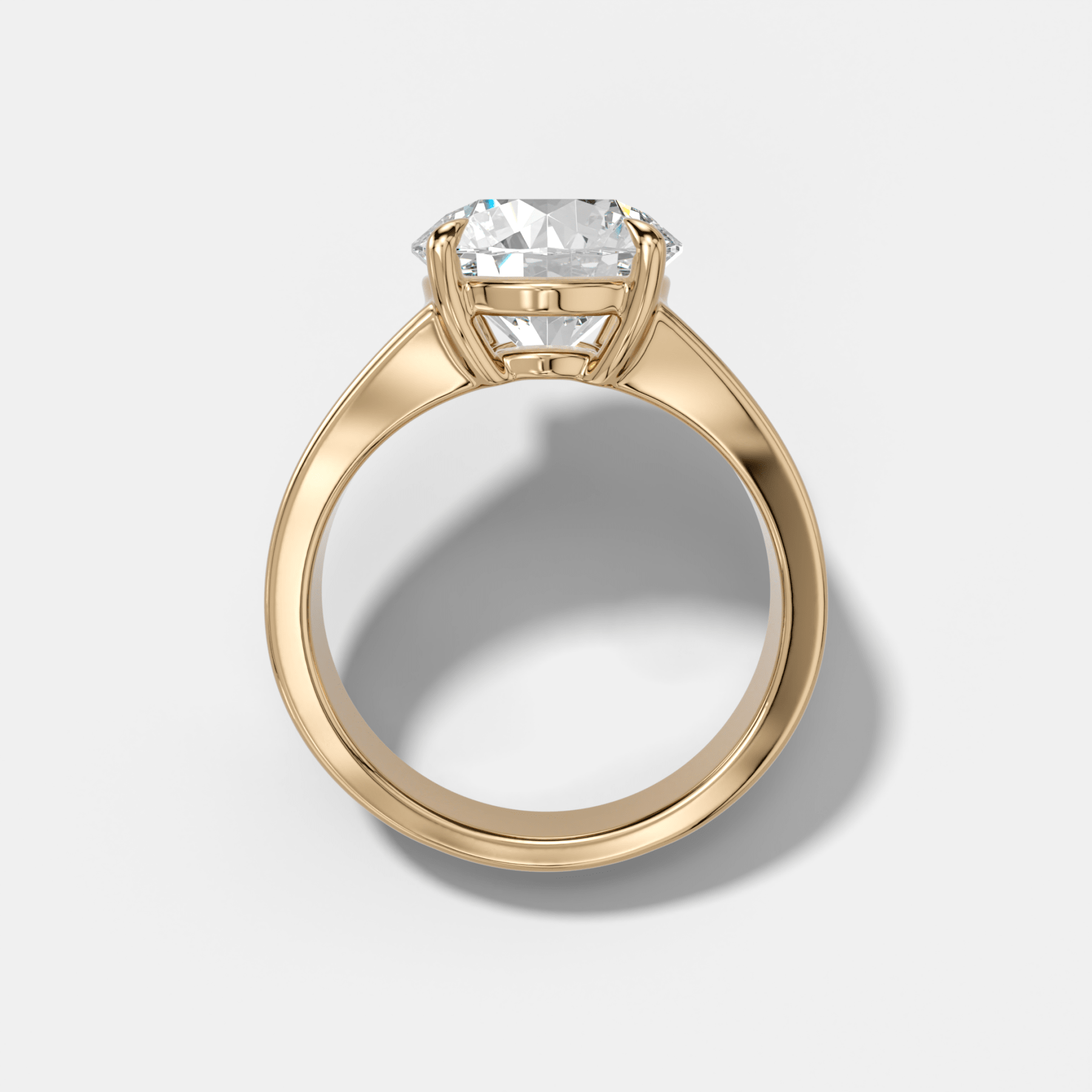 Finest Tapered Engagement Ring With Round Cut Diamond