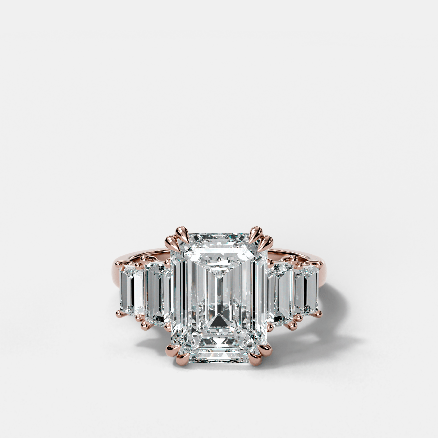 Five Stone Engagement Ring with Baguette Side Stones and Emerald Cut Diamond