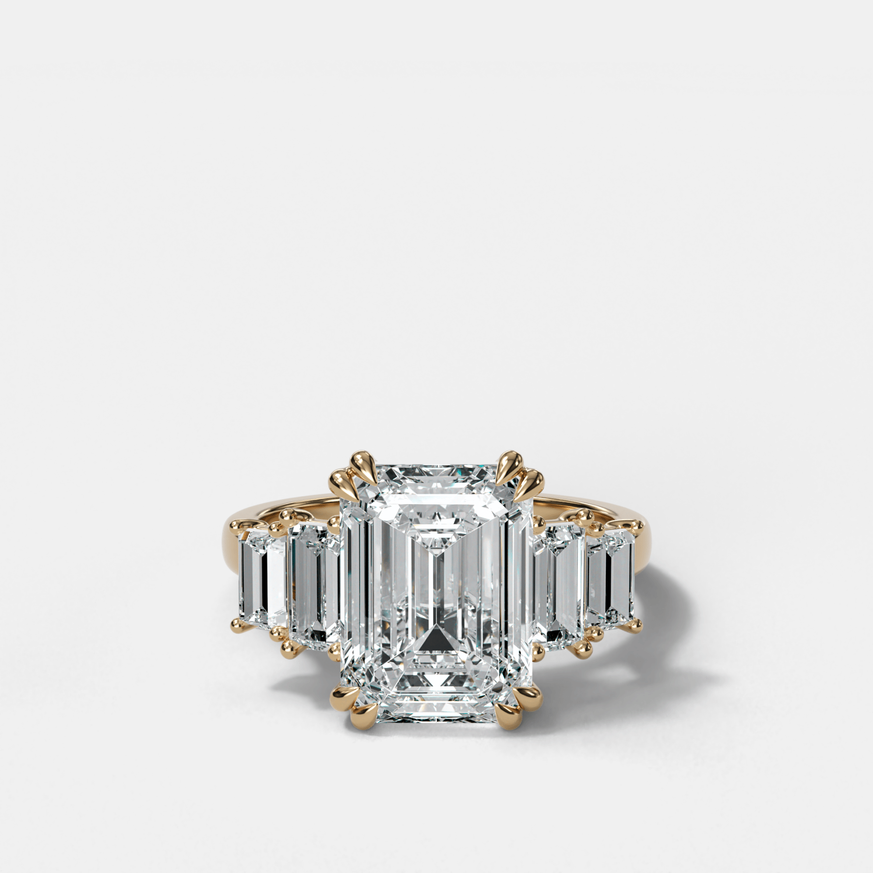 Five Stone Engagement Ring with Baguette Side Stones and Emerald Cut Diamond