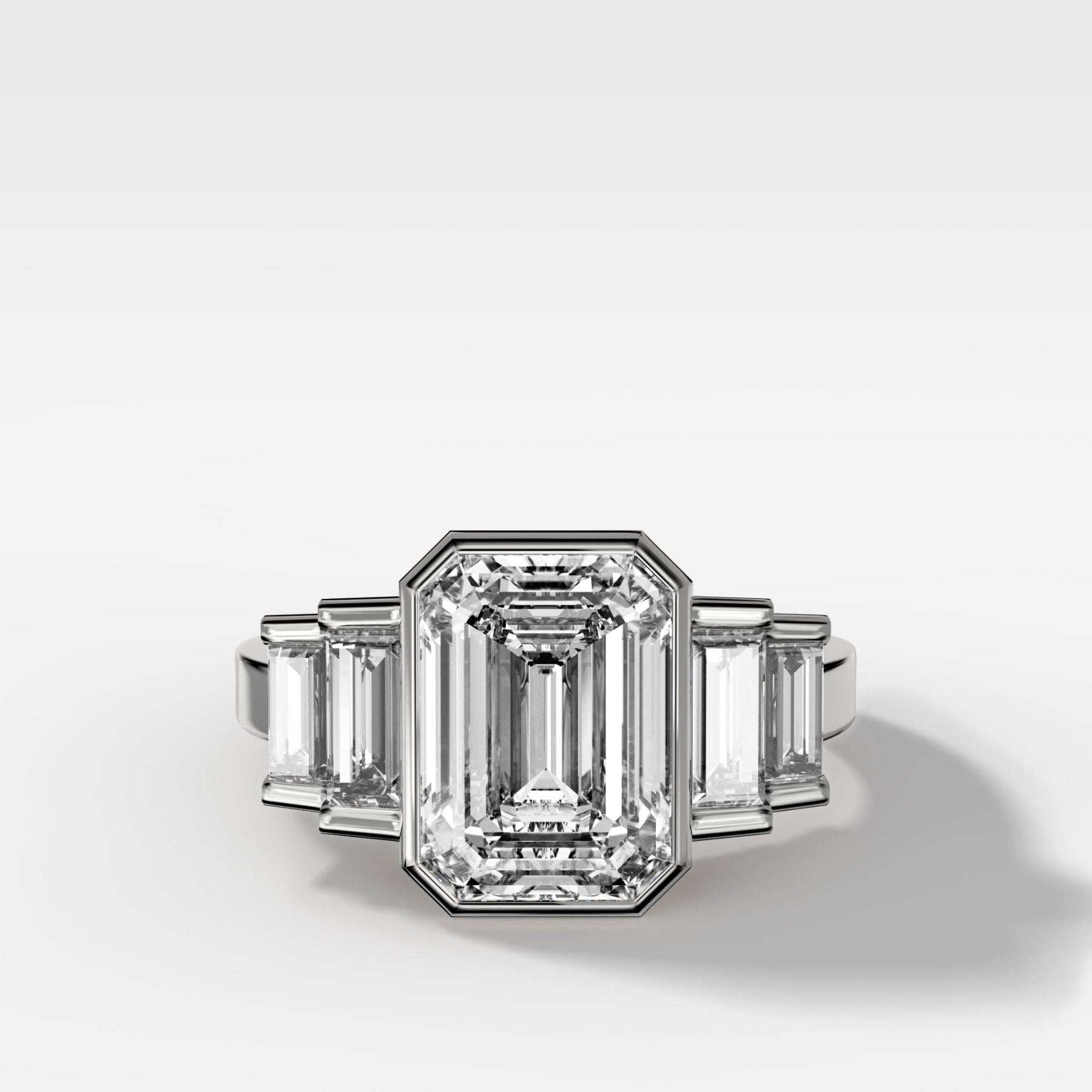Five Stone Engagement Ring with Half Bezel Baguette Side Stones and Bezel Set Emerald Cut Diamond
