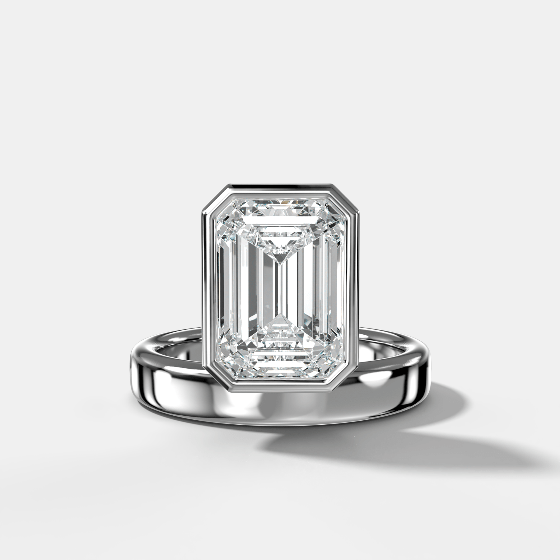Floating Engagement Ring with Emerald Cut Diamond