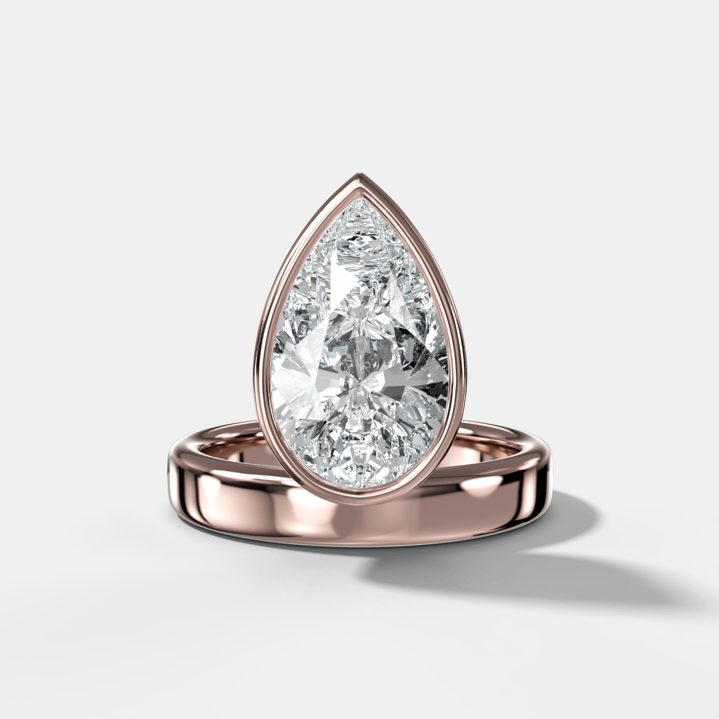 Floating Engagement Ring with Pear Cut Diamond