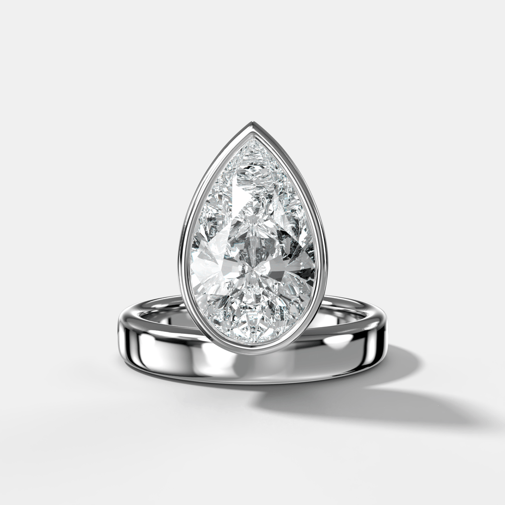 Floating Engagement Ring with Pear Cut Diamond