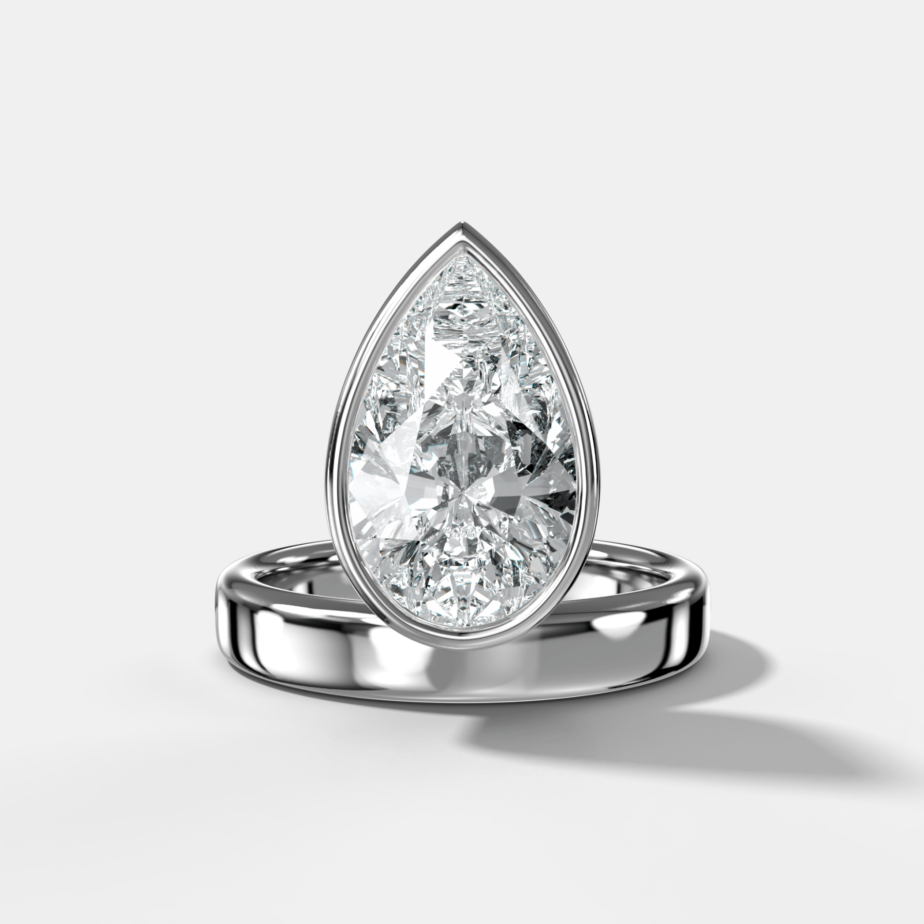 Floating Engagement Ring with Pear Cut Diamond