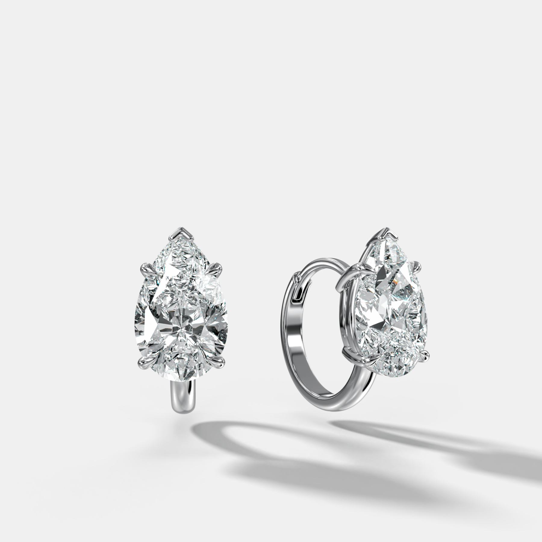 Floating Huggie with Pear Cut Diamonds