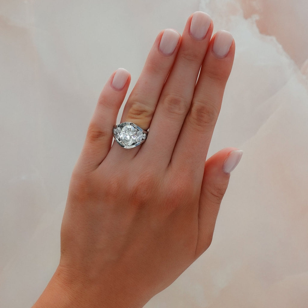 Full Channel Set Engagement Ring with Oval Cut Diamond