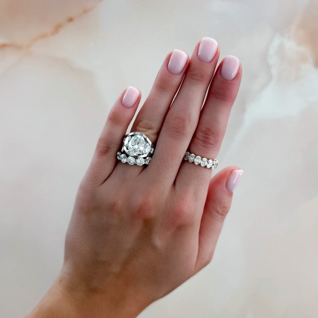 Full Channel Set Engagement Ring with Oval Cut Diamond