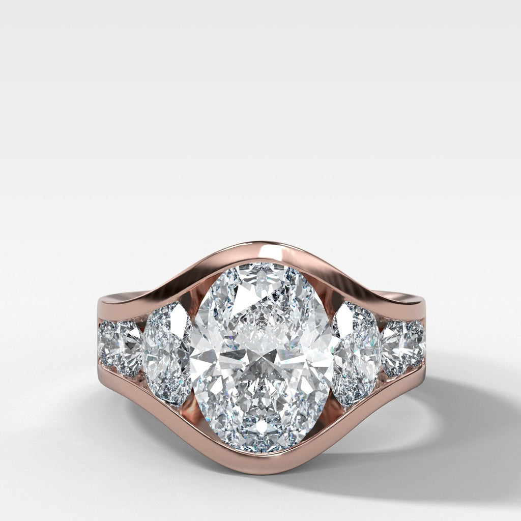 Full Channel Set Engagement Ring with Oval Cut Diamond