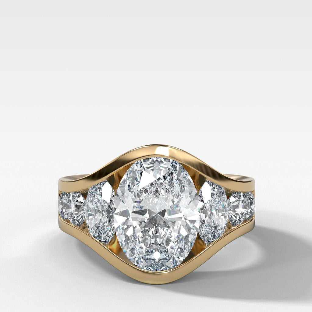 Full Channel Set Engagement Ring with Oval Cut Diamond