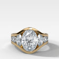 Full Channel Set Engagement Ring with Oval Cut Diamond