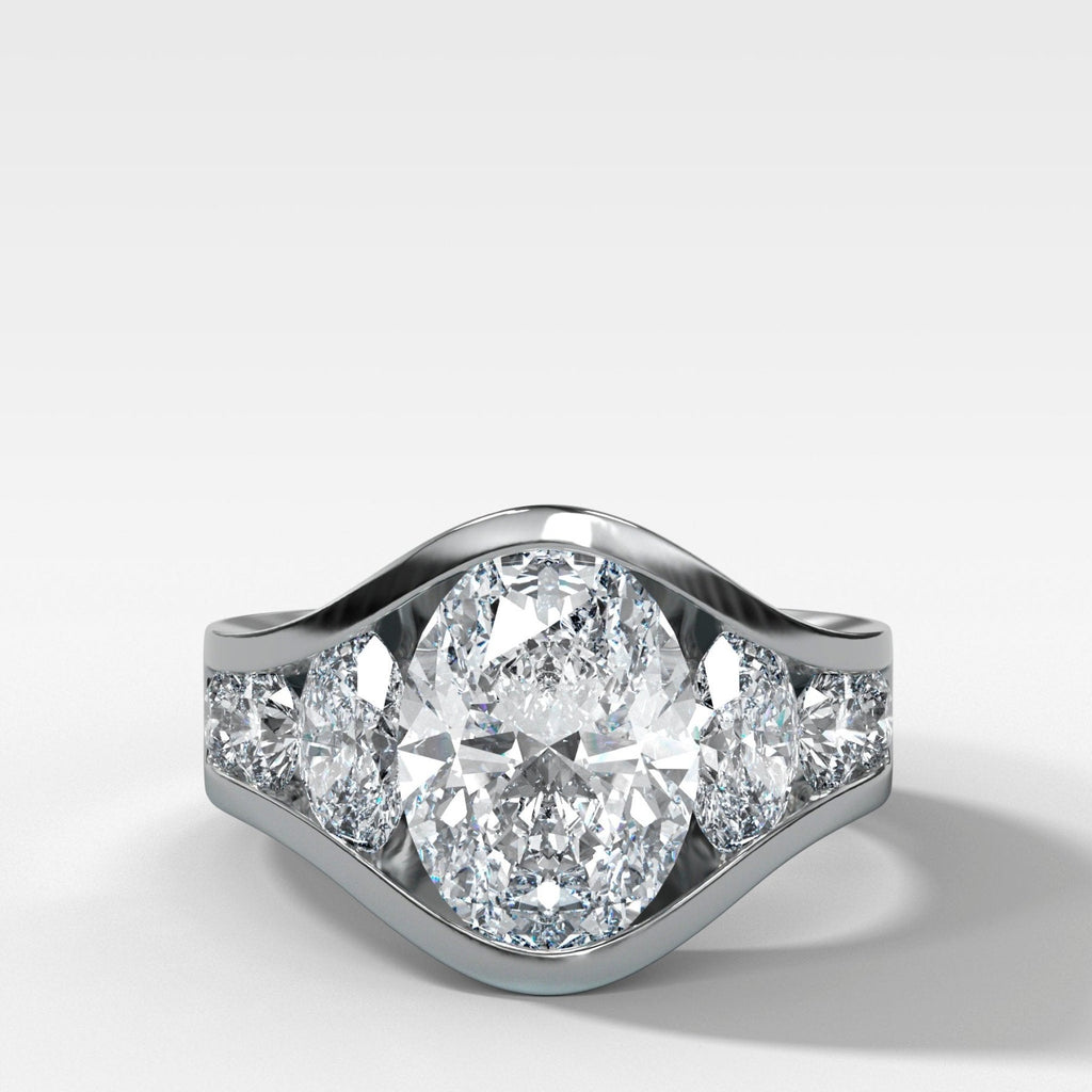 Full Channel Set Engagement Ring with Oval Cut Diamond