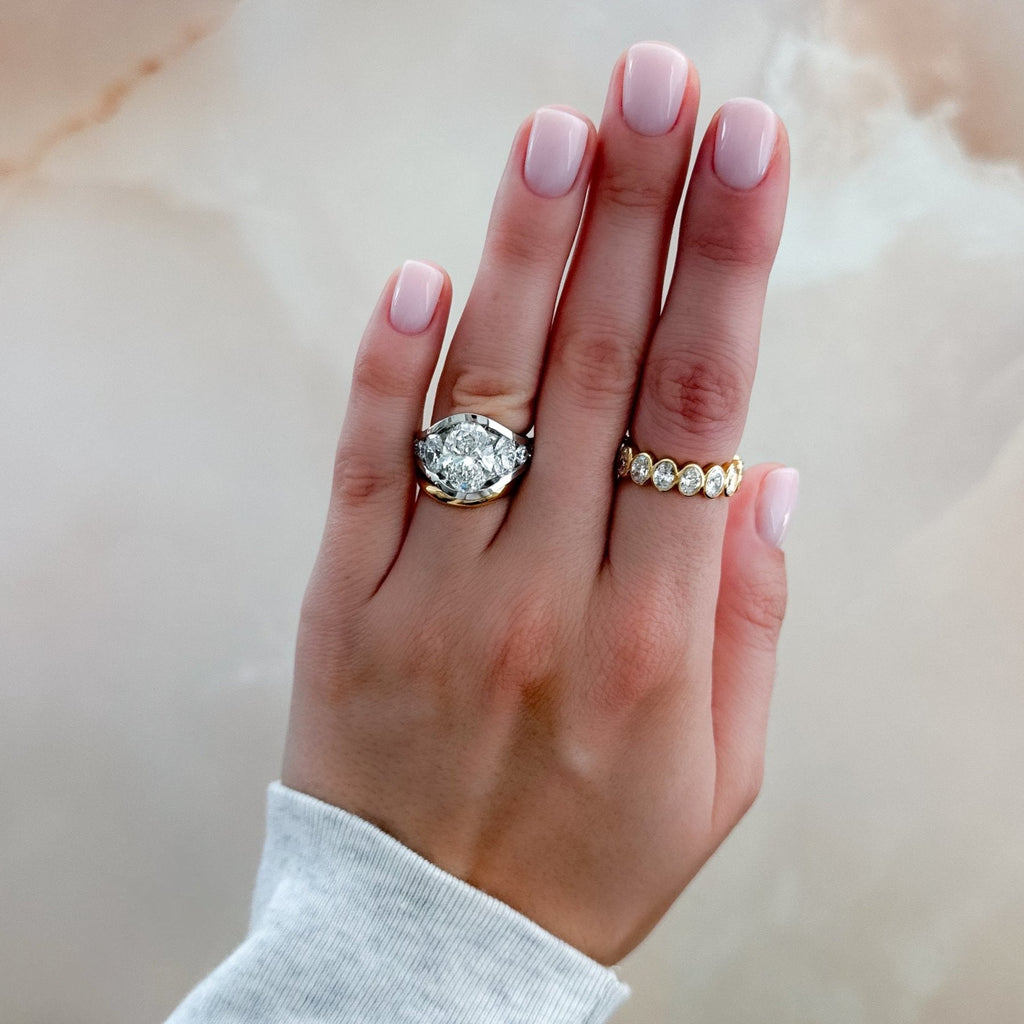 Full Channel Set Engagement Ring with Oval Cut Diamond