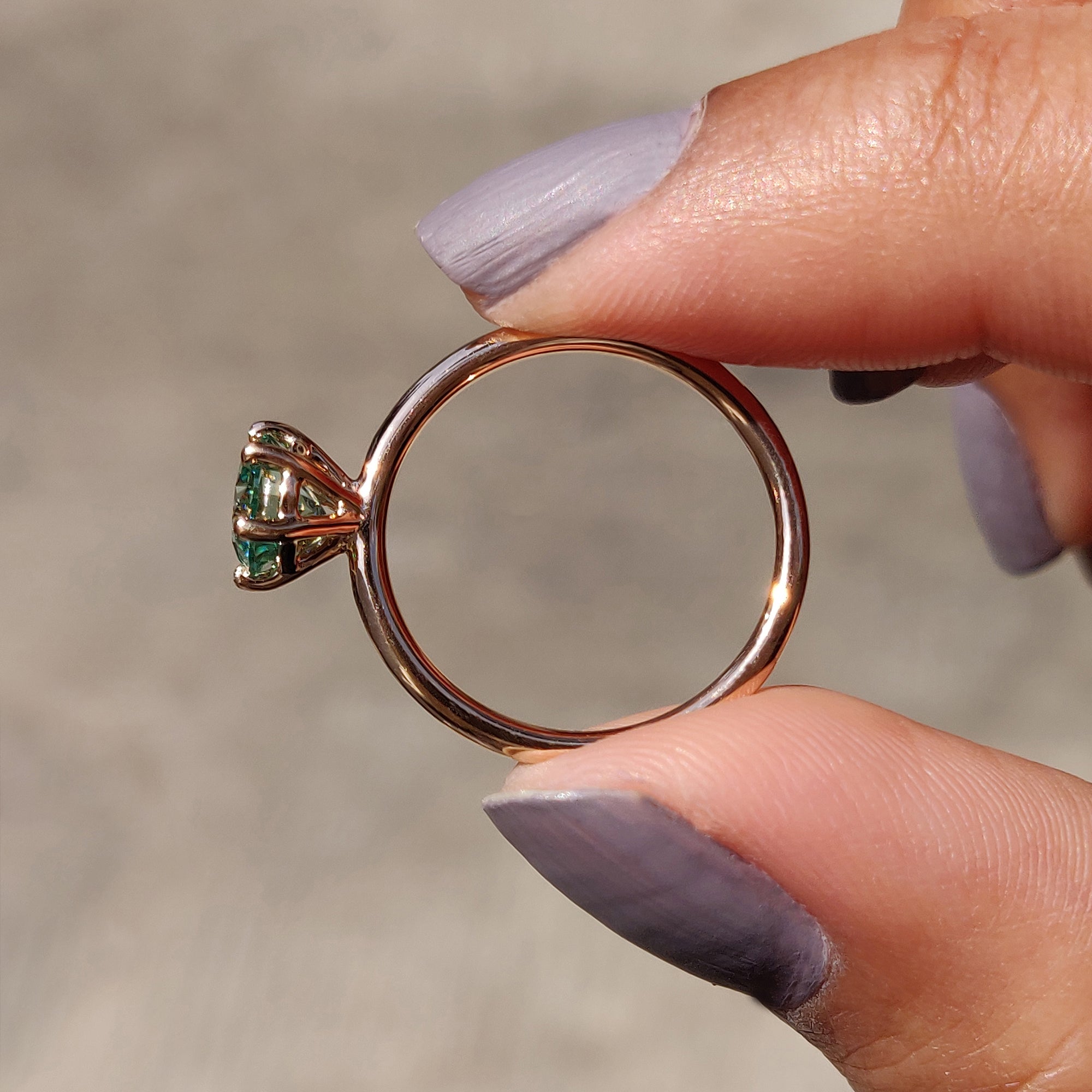 Round Solitaire Engagement Ring In Rose Gold