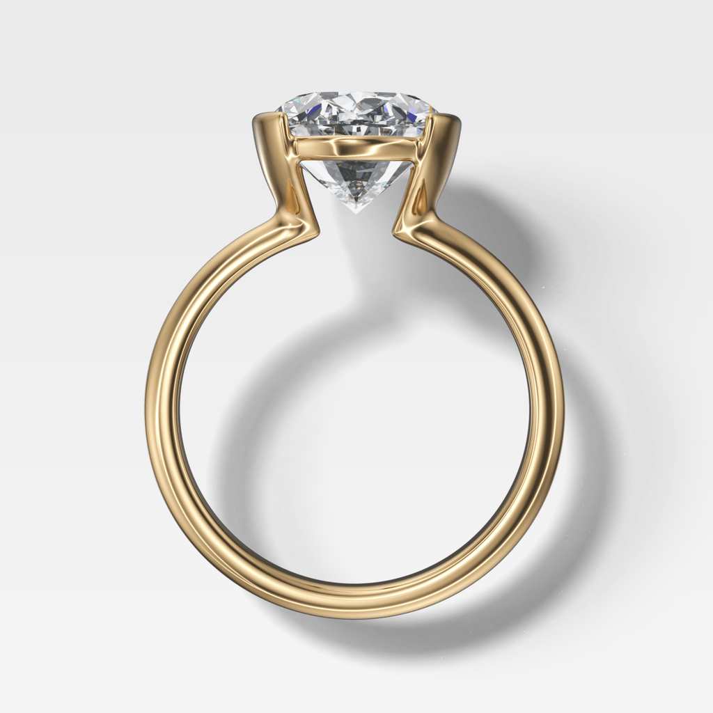 Half Bezel Solitaire Engagement Ring With Oval Cut Diamond