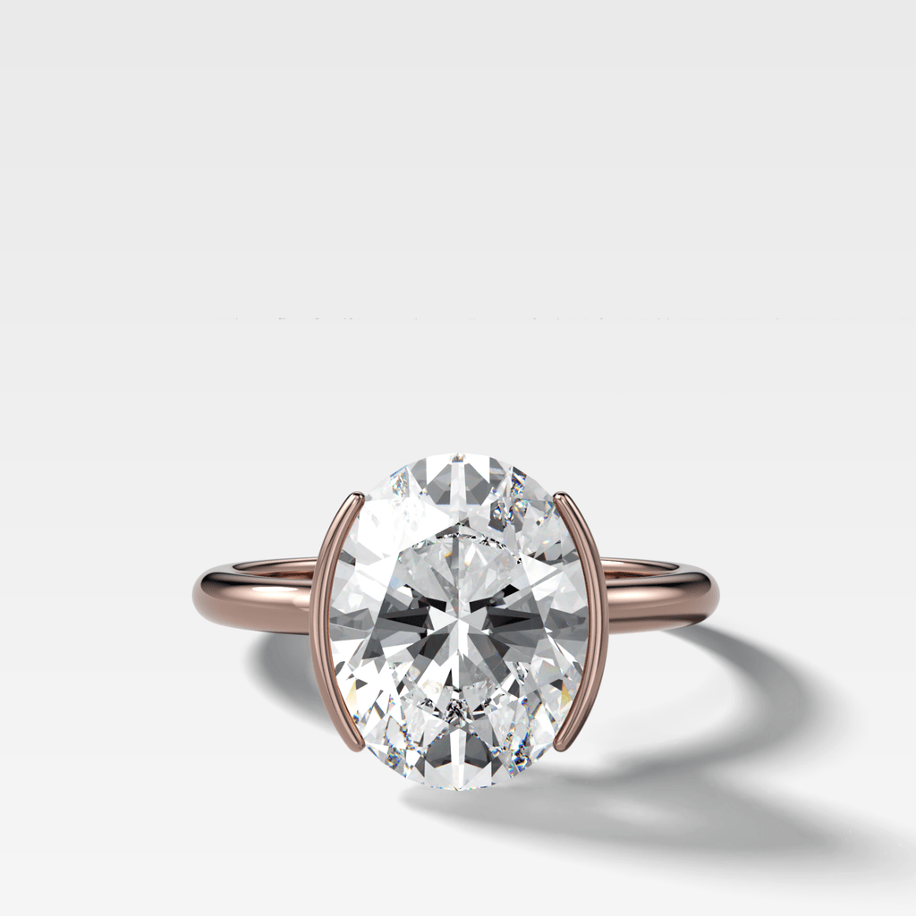 Half Bezel Solitaire Engagement Ring With Oval Cut Diamond