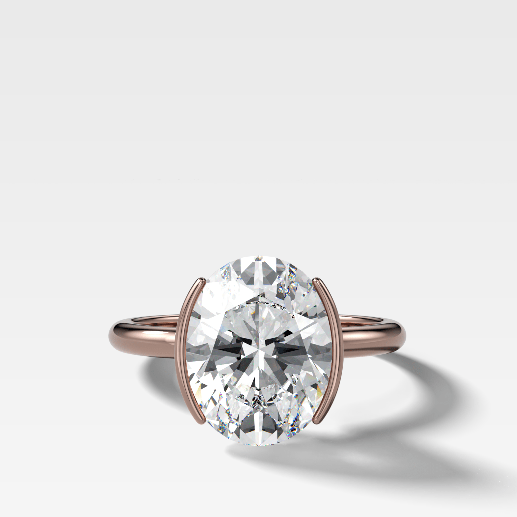 Half Bezel Solitaire Engagement Ring With Oval Cut Diamond