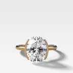 Half Bezel Solitaire Engagement Ring With Oval Cut Diamond