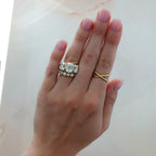 Half Bezel Triad Engagement Ring With Elongated Old Mine Cut Diamonds