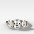 Half Bezel Triad Engagement Ring With Elongated Old Mine Cut Diamonds