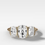 Half Bezel Triad Engagement Ring With Elongated Old Mine Cut Diamonds