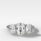 Half Bezel Triad Engagement Ring With Elongated Old Mine Cut Diamonds