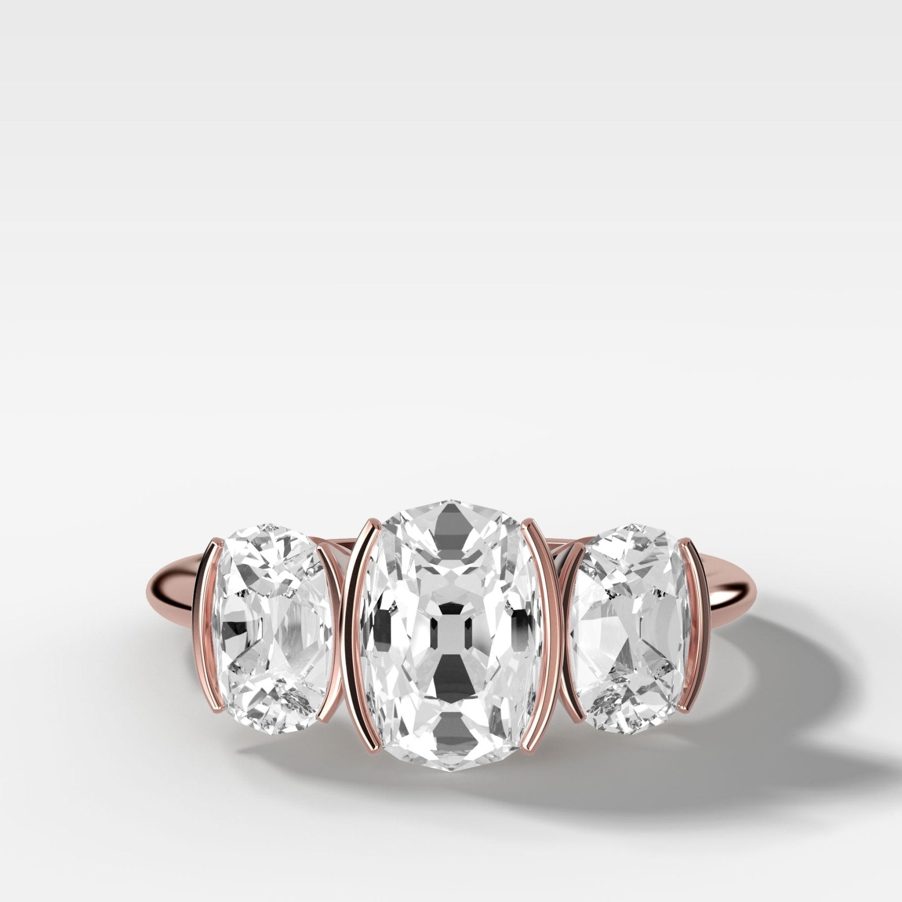 Half Bezel Triad Engagement Ring With Elongated Old Mine Cut Diamonds