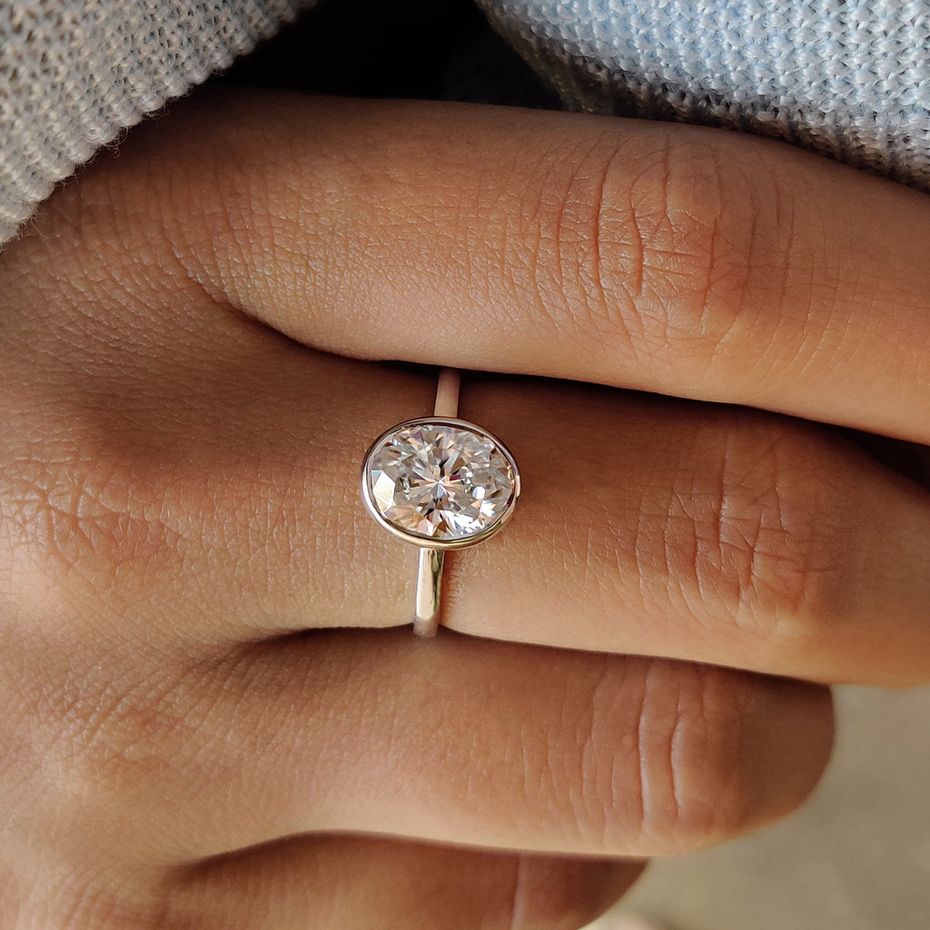 Oval Bezel Engagement Ring In Solitaire Style