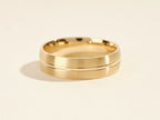 Man's Wedding Band With A Matte Finish and a Polished Groove Around The Center.