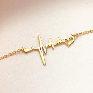 dainty heartbeat gold necklace