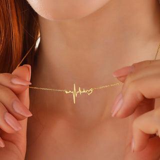 dainty heartbeat gold necklace